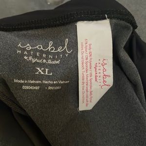 Grey maternity workout pants. With elastic waist and low cross back.